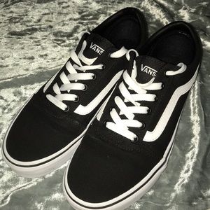 Black Vans sneakers